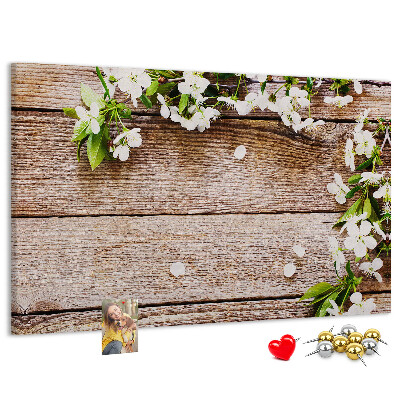 Korkbild mit Blumen auf einem Holzbrett-Hintergrund