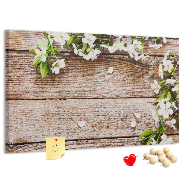 Korkbild mit Blumen auf einem Holzbrett-Hintergrund