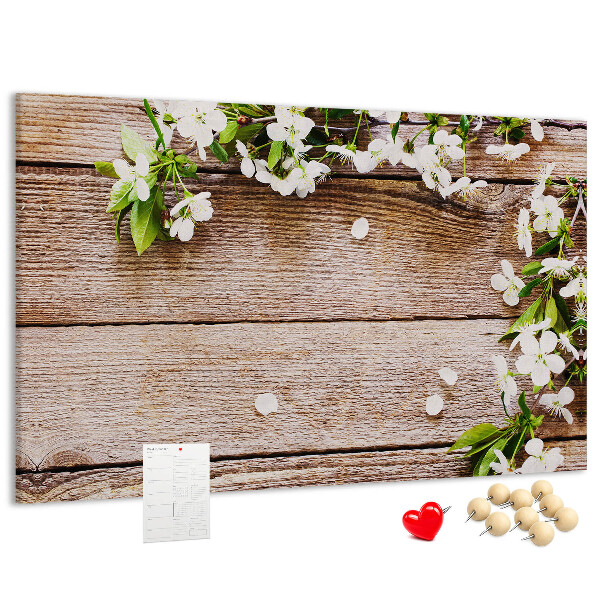 Korkbild mit Blumen auf einem Holzbrett-Hintergrund