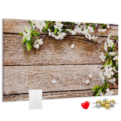 Korkbild mit Blumen auf einem Holzbrett-Hintergrund