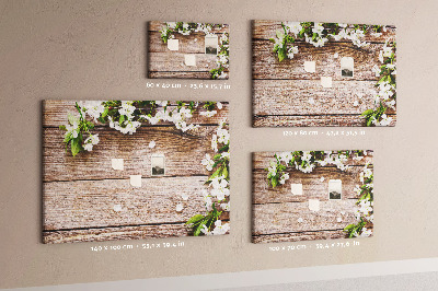 Korkbild mit Blumen auf einem Holzbrett-Hintergrund