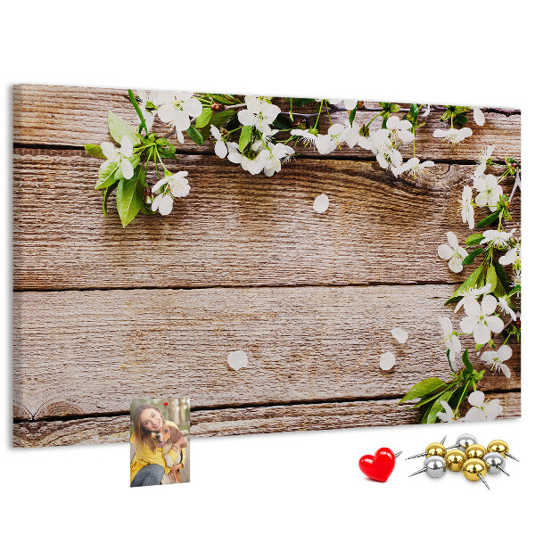 Korkbild mit Blumen auf einem Holzbrett-Hintergrund