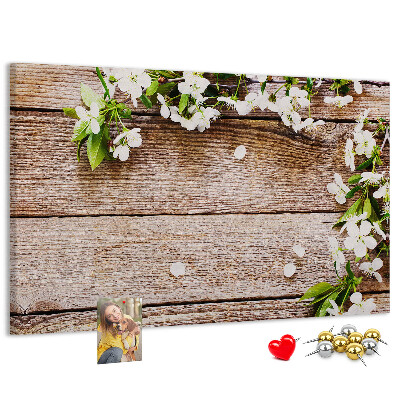 Korkbild mit Blumen auf einem Holzbrett-Hintergrund