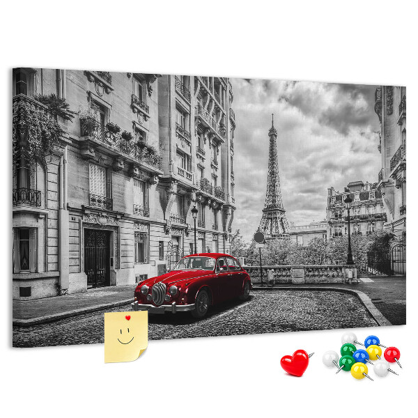 Korkbild rotes Auto vor der Kulisse von Paris
