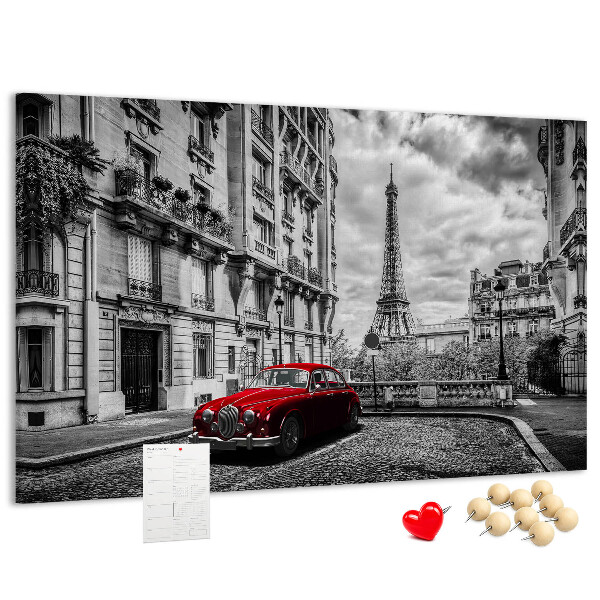 Korkbild rotes Auto vor der Kulisse von Paris