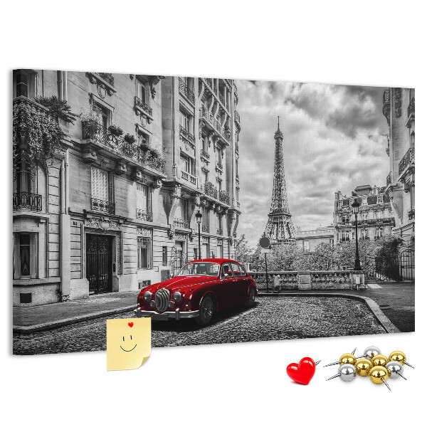 Korkbild rotes Auto vor der Kulisse von Paris