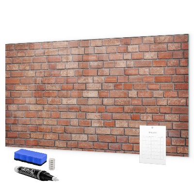 Schreib magnettafel Eine Notiztafel an einer Backsteinmauer