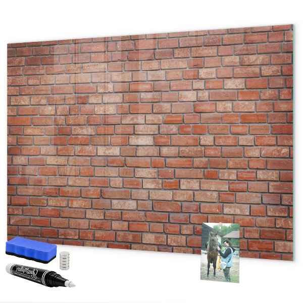 Schreib magnettafel Eine Notiztafel an einer Backsteinmauer