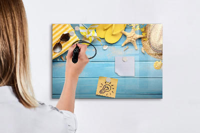 Magnettafel zum schreiben Sommererinnerungen auf blauem Hintergrund