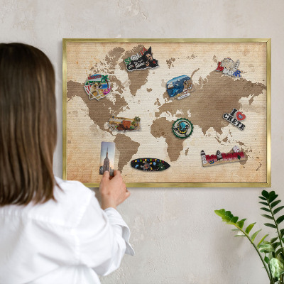 Magnettafel für Urlaubsmagnete in Goldrahmen Weltkarte