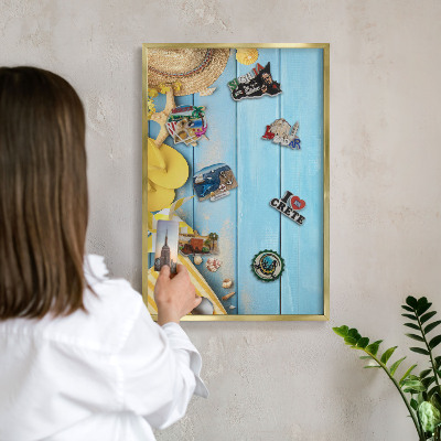 Magnettafel für Urlaubsmagnete in Goldrahmen Strandatmosphäre