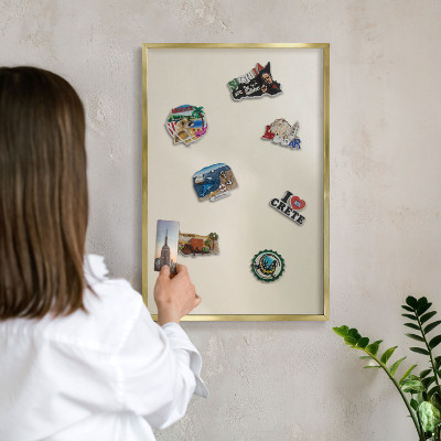 Magnettafel für Urlaubsmagnete in Goldrahmen Nebelton
