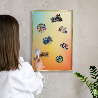 Magnettafel für Urlaubsmagnete in Goldrahmen Farbübergang