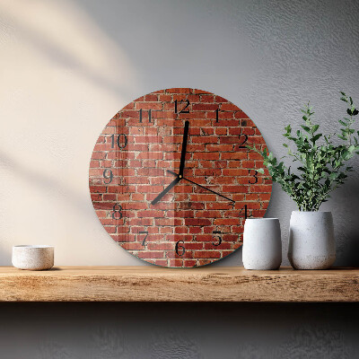 Wanduhr rund Ziegelmauer