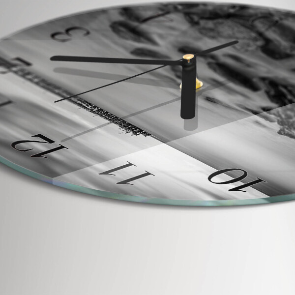 Wanduhr rund Flussufer