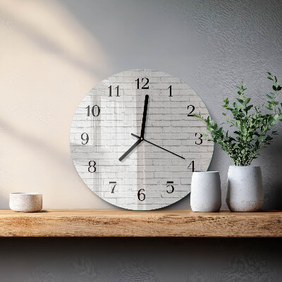 Wanduhr rund Ziegelmauer